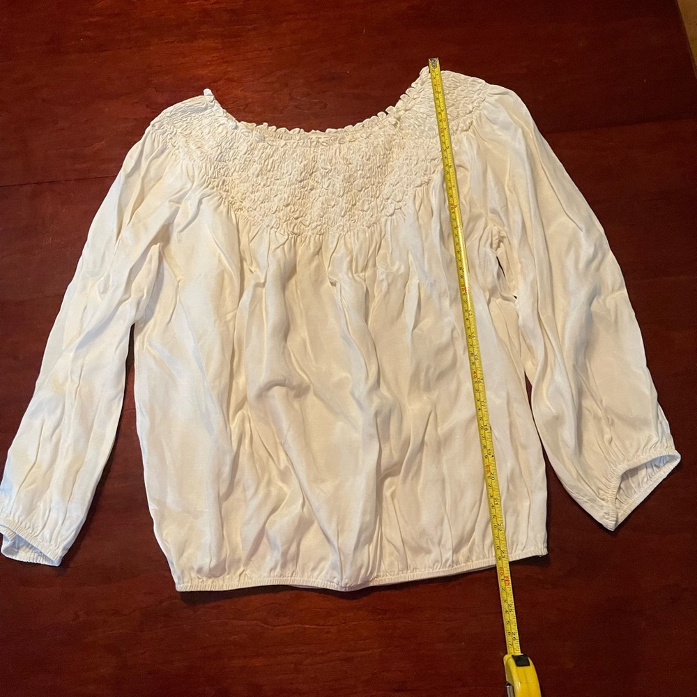 Smocked top can be worn on or off the shoulders